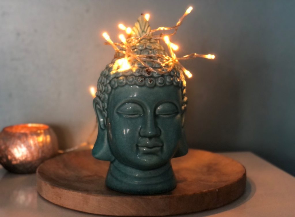 Buddhakopf mit Licht - psychoaktive Massagen